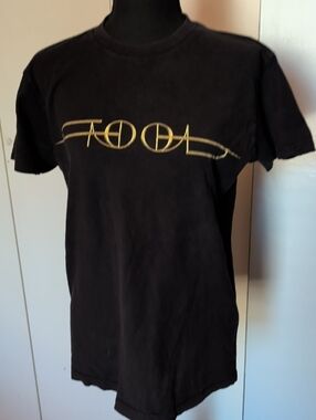 TOOL Black Tee with Gold Center Graphic
